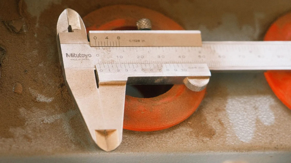 measuring hose thread with caliper