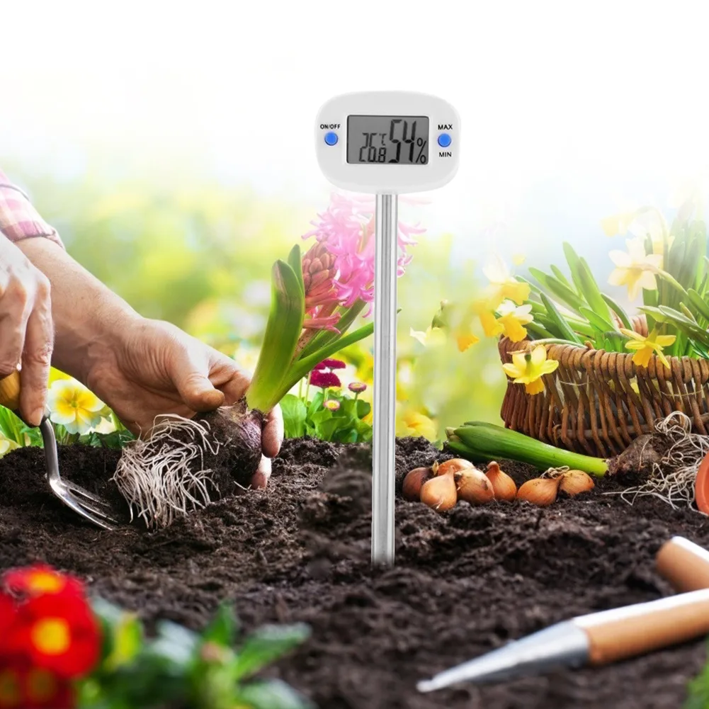 Soil temperature check with a probe thermometer